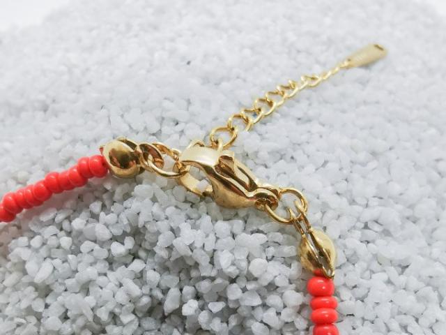 Bracelet en petites perles de plusieurs couleurs & Talisman Oeil